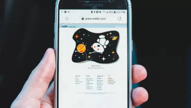 person holding black samsung android smartphone travel subreddits
