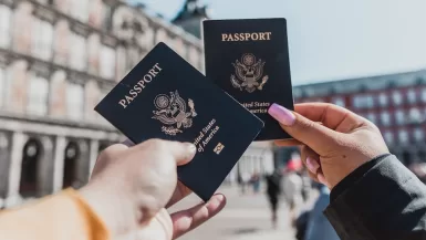 Do You need a Passport to go to Cancun? Expert Guide 35 Do You Need a Passport to go to Cancun? person holding passports